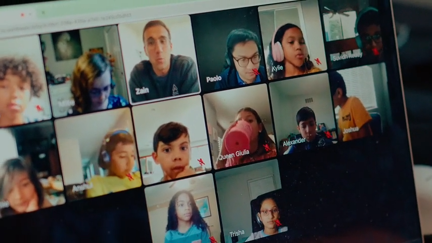 Grid of students in a live discussion session